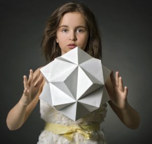 Portrait teen girl with paper in hand polygon figure.